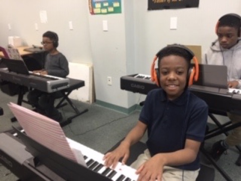 student playing piano